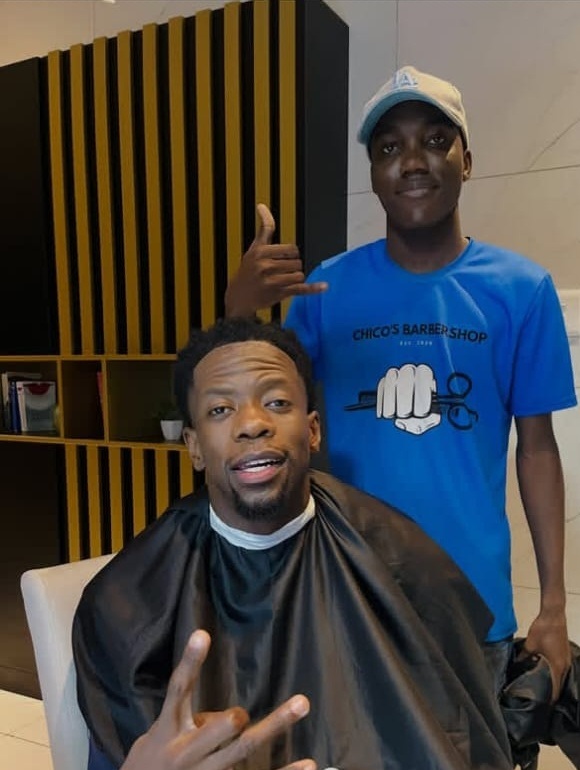 A Chico's client and barber after a fresh cut
